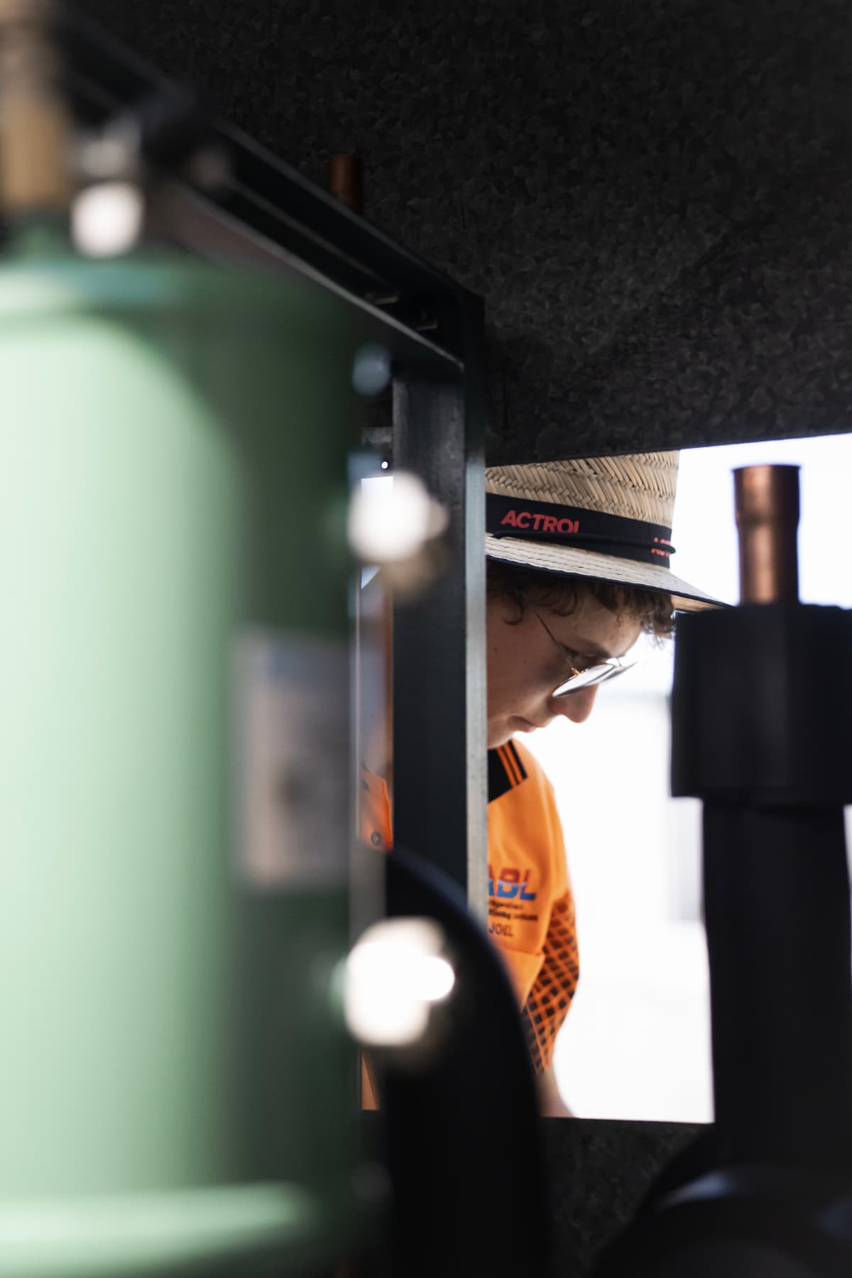 ABL technician focused on precision air conditioning work